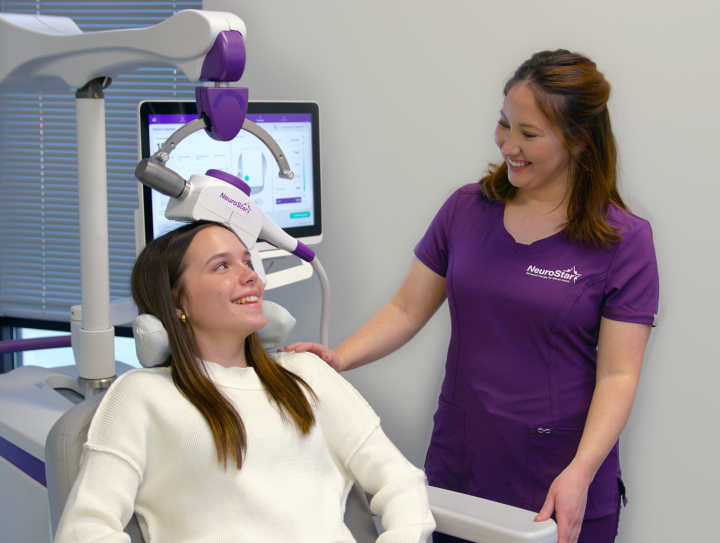 Patient receiving treatment with technician